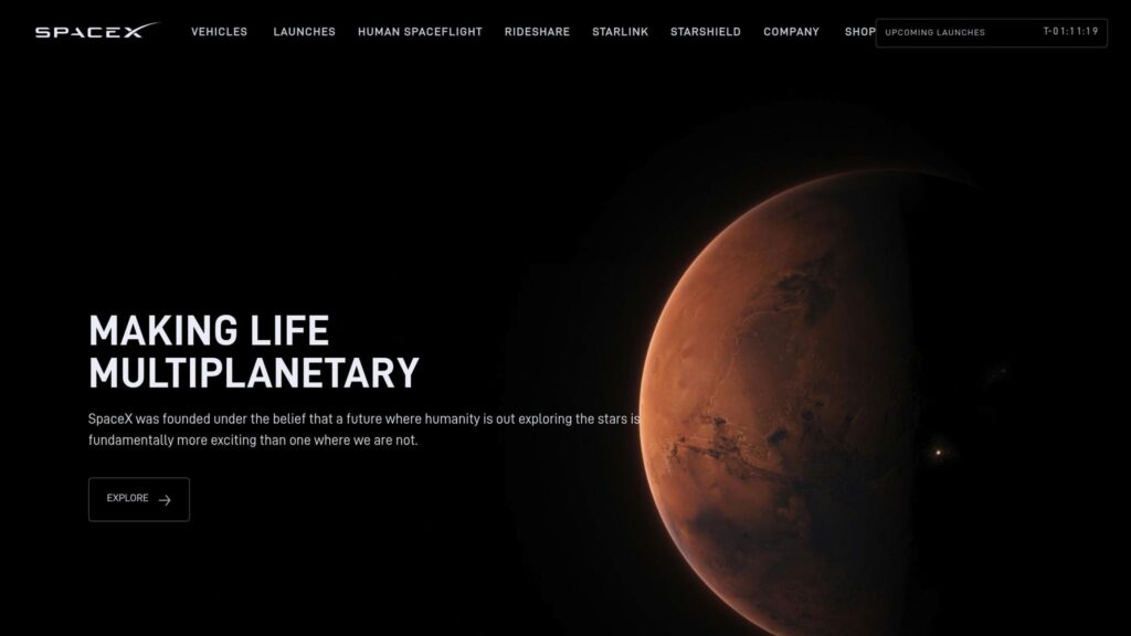 Website screenshot of SpaceX homepage showing the headline “MAKING LIFE MULTIPLANETARY,” navigation links across the top, an “Explore” button, and a large image of Mars on a dark background.
